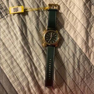 Invicta men’s quartz 50mm gold case green dial